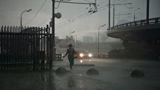 Дождь в Москве. Архивное фото Дождь в Москве. Архивное фото