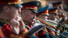 Музыканты военного оркестра во время выступления в рамках программы Военные оркестры в парках Музыканты военного оркестра во время выступления в рамках программы Военные оркестры в парках