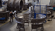 Производство газовых турбин на заводе компании Siemens. Архивное фото Производство газовых турбин на заводе компании Siemens. Архивное фото