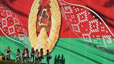 Флаг Белоруссии во время празднования Дня Независимости в Минске. Архивное фото Флаг Белоруссии во время празднования Дня Независимости в Минске. Архивное фото