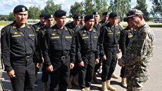 Команда Казахстана перед началом репетиции международного этапа конкурса Танковый биатлон Армейских международных игр-2017 в Алабино. Архивное фото Команда Казахстана перед началом репетиции международного этапа конкурса Танковый биатлон Армейских международных игр-2017 в Алабино. Архивное фото