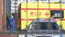 Автомобиль скорой медицинской помощи у здания Московского областного суда, в котором произошла перестрелка. 1 августа 2017 Автомобиль скорой медицинской помощи у здания Московского областного суда, в котором произошла перестрелка. 1 августа 2017
