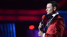 Телеведущий Александр Олешко. Архивное фото Телеведущий Александр Олешко. Архивное фото