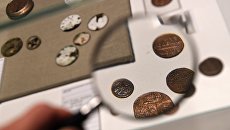 Монеты на выставке Тайны московских подземелий в Музее Москвы Монеты на выставке Тайны московских подземелий в Музее Москвы