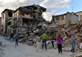 Дома в городе Аматриче, разрушенные в результате землетрясения, Италия Дома в городе Аматриче, разрушенные в результате землетрясения, Италия