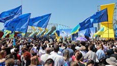 Символическая церемония на украинском-словацкой границе по случаю введения безвизового режима между Украиной и ЕС. Архивное фото Символическая церемония на украинском-словацкой границе по случаю введения безвизового режима между Украиной и ЕС. Архивное фото