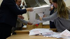 Члены избирательной комиссии во время подсчета голосов в единый день голосования на избирательном участке. 10 сентября 2017 Члены избирательной комиссии во время подсчета голосов в единый день голосования на избирательном участке. 10 сентября 2017