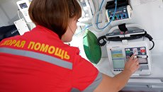 Врач скорой медицинской помощи. Архивное фото Врач скорой медицинской помощи. Архивное фото