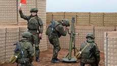 Минометный расчет вооруженных сил РФ во время учений вооружённых сил России и Белоруссии на Лужском полигоне в Ленинградской области. 13 сентября 2017 Минометный расчет вооруженных сил РФ во время учений вооружённых сил России и Белоруссии на Лужском полигоне в Ленинградской области. 13 сентября 2017