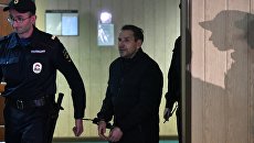 Подозреваемый в нападении на журналистку Эха Москвы. Архивное фото Подозреваемый в нападении на журналистку Эха Москвы. Архивное фото