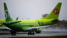 Самолет авиакомпании S7 Airlines. Архивное фото Самолет авиакомпании S7 Airlines. Архивное фото