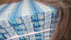Пачки с денежными купюрами номиналом 2000 рублей на Пермской печатной фабрике Пачки с денежными купюрами номиналом 2000 рублей на Пермской печатной фабрике