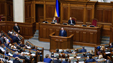 Генеральный прокурор Украины Юрий Луценко выступает на заседании Верховной рады Украины. Архивное фото Генеральный прокурор Украины Юрий Луценко выступает на заседании Верховной рады Украины. Архивное фото