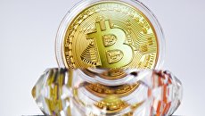 Криптовалюта биткоин. Архивное фото Криптовалюта биткоин. Архивное фото