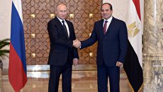 Президент РФ Владимир Путин и президент Египта Абдельфаттах Сиси во время встречи в Каире. 11 декабря 2017 Президент РФ Владимир Путин и президент Египта Абдельфаттах Сиси во время встречи в Каире. 11 декабря 2017