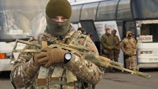 Украинский военнослужащий во время обмена пленными между ЛНР и ДНР и Киевом между поселками Майорск и Горловка. 27 декабря 2017 Украинский военнослужащий во время обмена пленными между ЛНР и ДНР и Киевом между поселками Майорск и Горловка. 27 декабря 2017