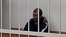 Дмитрий Лукьяненко, обвиняемый в организации взрыва в магазине Перекресток на Кондратьевском проспекте, на заседании Калининского суда Санкт-Петербурга. 31 декабря 2017 Дмитрий Лукьяненко, обвиняемый в организации взрыва в магазине Перекресток на Кондратьевском проспекте, на заседании Калининского суда Санкт-Петербурга. 31 декабря 2017
