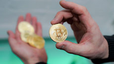 Криптовалюта биткоин. Архивное фото Криптовалюта биткоин. Архивное фото