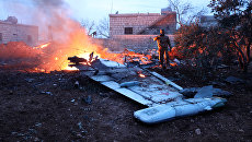 Обломки сбитого боевиками российского самолета Су-25 в Сирии. 3 февраля 2018 Обломки сбитого боевиками российского самолета Су-25 в Сирии. 3 февраля 2018