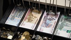 Деньги в кассовом аппарате Деньги в кассовом аппарате