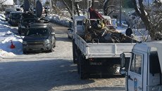 Автомашины МЧС России вывозят фрагменты самолета Ан-148 с места крушения в Раменском районе. 13 февраля 2018 Автомашины МЧС России вывозят фрагменты самолета Ан-148 с места крушения в Раменском районе. 13 февраля 2018