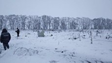 Обломки на месте крушения самолета Ан-148 авиакомпании Саратовские авиалинии. Архивное фото Обломки на месте крушения самолета Ан-148 авиакомпании Саратовские авиалинии. Архивное фото