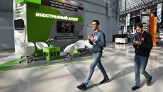 Стенд российского международного многоязычного информационного телеканала RT во время подготовки стендов к выставке в рамках Российского инвестиционного форума в Сочи. 14 февраля 2018 Стенд российского международного многоязычного информационного телеканала RT во время подготовки стендов к выставке в рамках Российского инвестиционного форума в Сочи. 14 февраля 2018