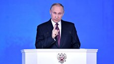Президент РФ Владимир Путин выступает с ежегодным посланием Федеральному Собранию в ЦВЗ Манеж. 1 марта 2018 Президент РФ Владимир Путин выступает с ежегодным посланием Федеральному Собранию в ЦВЗ Манеж. 1 марта 2018