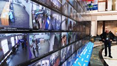 Трансляция голосования избирателей на выборах президента РФ в информационном центре Центральной избирательной комиссии РФ. 18 марта 2018 Трансляция голосования избирателей на выборах президента РФ в информационном центре Центральной избирательной комиссии РФ. 18 марта 2018