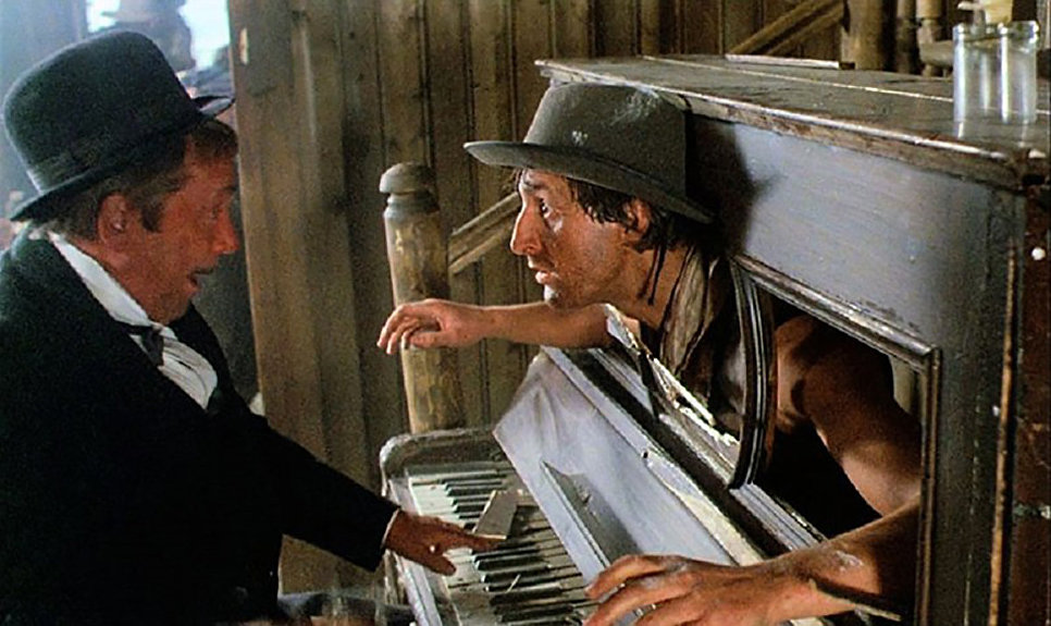 Олег Анофриев (слева) в фильме Человек с бульвара Капуцинов(1989) Олег Анофриев (слева) в фильме Человек с бульвара Капуцинов(1989)