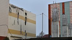 Следы пожара на фасаде торгово-развлекательного центра Зимняя вишня в Кемерово Следы пожара на фасаде торгово-развлекательного центра Зимняя вишня в Кемерово