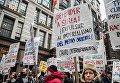 Участники акции протеста против ударов по Сирии в Нью-Йорке Участники акции протеста против ударов по Сирии в Нью-Йорке
