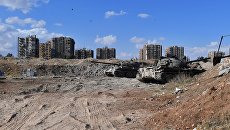 Ситуация в районе лагеря беженцев Ярмук на юге Дамаска. Архивное фото Ситуация в районе лагеря беженцев Ярмук на юге Дамаска. Архивное фото