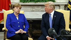 Президент США Дональд Трамп и канцлер Германии Ангела Меркель. Архивное фото Президент США Дональд Трамп и канцлер Германии Ангела Меркель. Архивное фото