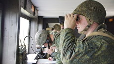Военнослужащие во время учений Народной милиции ЛНР по огневой подготовке. Архивное фото Военнослужащие во время учений Народной милиции ЛНР по огневой подготовке. Архивное фото