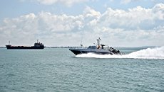 Патрульный катер береговой охраны Пограничной службы ФСБ России в Керченском проливе. Архивное фото Патрульный катер береговой охраны Пограничной службы ФСБ России в Керченском проливе. Архивное фото