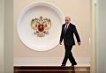 Избранный президент РФ Владимир Путин во время церемонии инаугурации в Кремль. 7 мая 2018 Избранный президент РФ Владимир Путин во время церемонии инаугурации в Кремль. 7 мая 2018