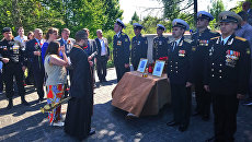 Поминальная служба на братской могиле в поселке Пятидорожное Калининградской области Поминальная служба на братской могиле в поселке Пятидорожное Калининградской области