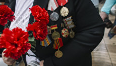 Участник акции Бессмертный полк Участник акции Бессмертный полк