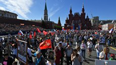 Участники акции Бессмертный полк в Москве. 9 мая 2018 Участники акции Бессмертный полк в Москве. 9 мая 2018