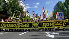 Участники торжественного шествия в Донецке, посвященном Дню самопровозглашенной Донецкой народной республики. 11 мая 2018 Участники торжественного шествия в Донецке, посвященном Дню самопровозглашенной Донецкой народной республики. 11 мая 2018