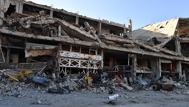 Разрушенные строения в районе бывшего лагеря палестинских беженцев Ярмук в южном пригороде Дамаска. Архивное фото