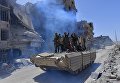 Военнослужащие сирийской армии на БМД-1 в освобожденном лагере палестинских беженцев Ярмук на юге Дамаска Военнослужащие сирийской армии на БМД-1 в освобожденном лагере палестинских беженцев Ярмук на юге Дамаска