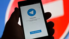 Логотип мессенджера Telegram. Архивное фото Логотип мессенджера Telegram. Архивное фото