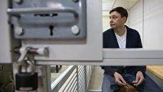 Руководитель портала РИА Новости Украина Кирилл Вышинский во время рассмотрения апелляции на арест в Херсонском зале суда. 29 мая 2018 Руководитель портала РИА Новости Украина Кирилл Вышинский во время рассмотрения апелляции на арест в Херсонском зале суда. 29 мая 2018