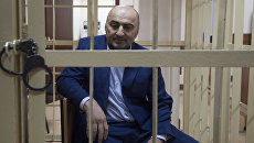 Начальник оперативно-разыскной части собственной безопасности МВД по Дагестану Магомед Хизриев в Пресненском суде Москвы. 7 июня 2018 Начальник оперативно-разыскной части собственной безопасности МВД по Дагестану Магомед Хизриев в Пресненском суде Москвы. 7 июня 2018