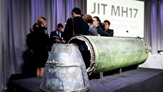 Объединенная следственная группа (JIT) во время презентации предварительных выводов. 24 мая 2018 Объединенная следственная группа (JIT) во время презентации предварительных выводов. 24 мая 2018