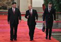 Президент РФ Владимир Путин и председатель КНР Си Цзиньпин во время встречи в Пекине. 8 июня 2018 Президент РФ Владимир Путин и председатель КНР Си Цзиньпин во время встречи в Пекине. 8 июня 2018