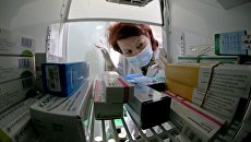 Лекарственные препараты в холодильнике. Архивное фото Лекарственные препараты в холодильнике. Архивное фото