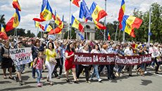 Сторонники Андрея Нэстасе на митинге против решения суда, не признавшего итоги голосования. Архивное фото Сторонники Андрея Нэстасе на митинге против решения суда, не признавшего итоги голосования. Архивное фото